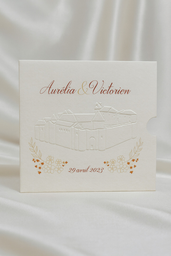 Faire-part de mariage pochette avec gaufrage dessin du chateau sur papier texturé