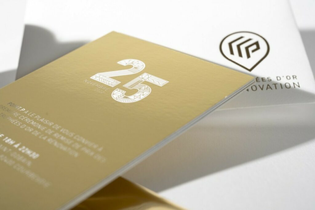 Carton d’invitation cérémonie trophées d’or – Ticket d’or en contre collage duplex 600gr – Dorure numérique