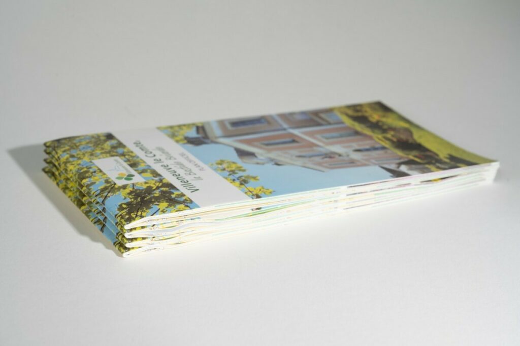 Plan de ville dépliant 10x21cm fermé avec 5 plis accordéons et 1 pli croisé – couché brillant 150g
